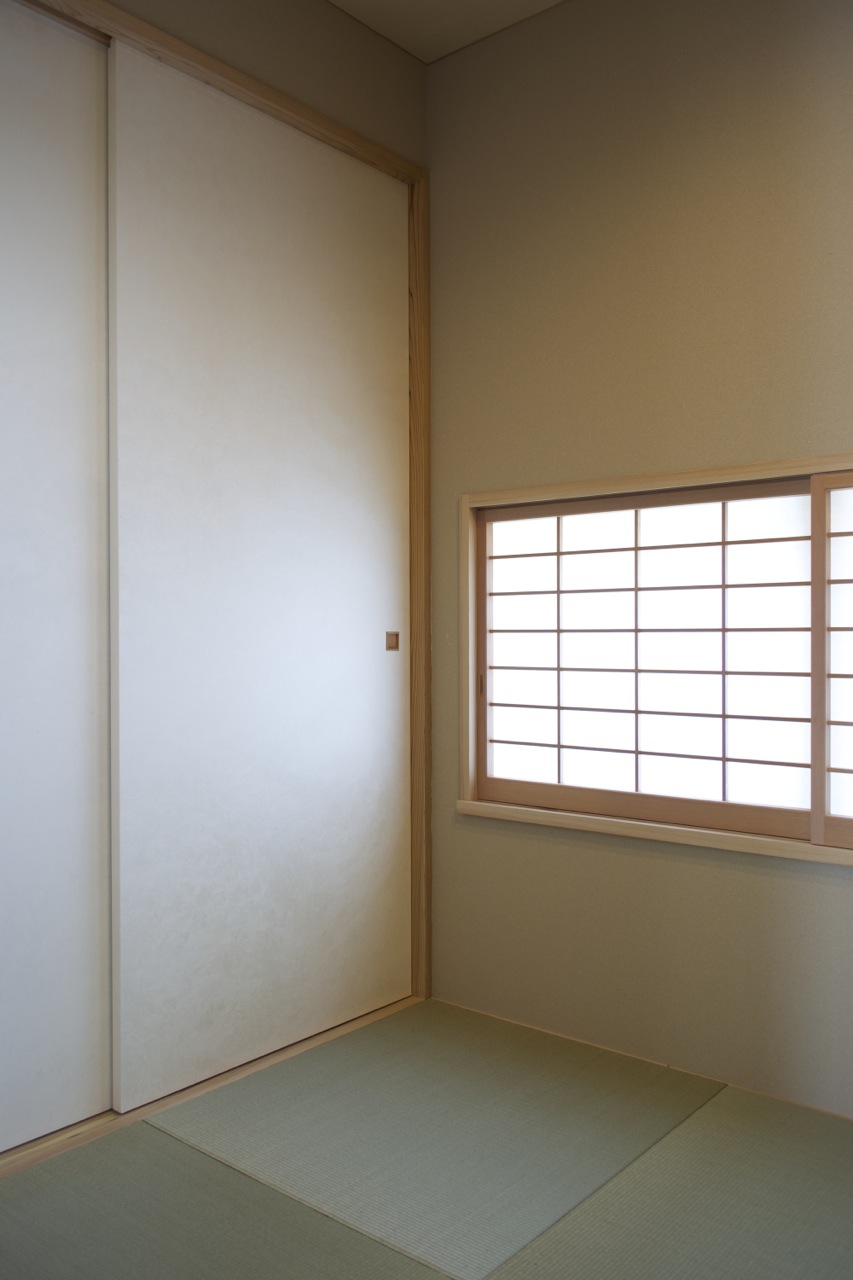 Japanese room with screen closed.   Japanese room with screen closed.
